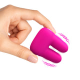 Bang Dual Silicone Clitoral Vibrator Pink held in hand, showcasing its compact design and soft silicone texture.