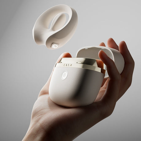 ZALO Apis Vibrating Couples Ring Ivory White showcased in an elegant hand, highlighting its premium design and compact form.