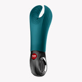 Fun Factory Manta Vibrating Masturbator Bottle Green featuring flexible wings and grooved structure.