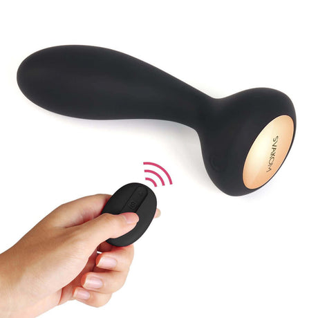 Svakom Julie Powerful Anal Plug with Remote Control Black showcased in a hand for intimate play.