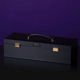 Luxurious black Italian leather bondage tools case with gold accents, featuring a sleek design and sturdy handle.