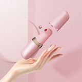 Sweet Secret Dual Massager Pink displayed in hand, highlighting elegant design and unique features.