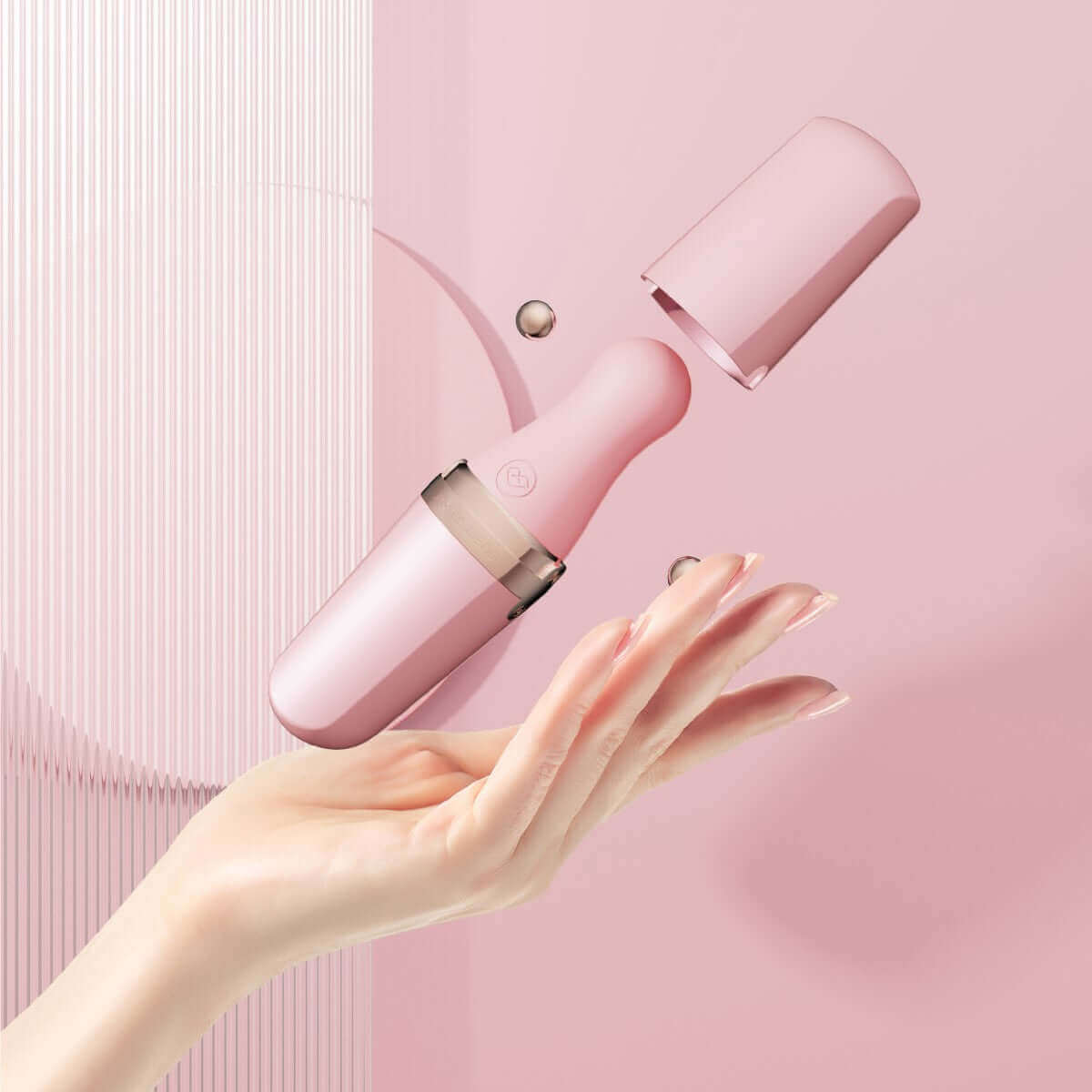 Sweet Secret Dual Massager Pink in hand, showcasing its elegant design and dual-stimulation features.