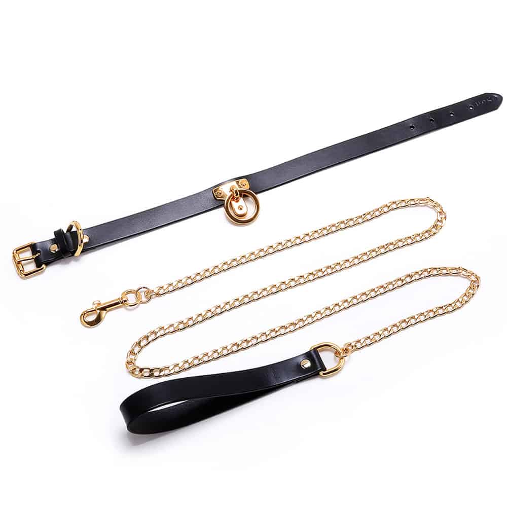 Luxury BDSM leather collar and gold chain leash set for high-end SM experiences, featuring premium materials and craftsmanship.