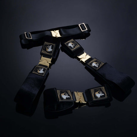 UPKO Clack Bondage Restraints Gear featuring durable black straps and golden buckles for versatile use and secure restraint.