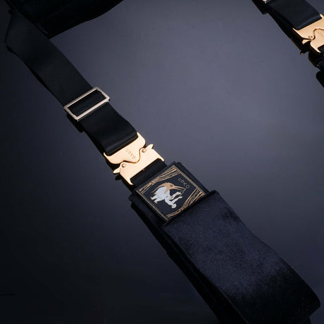UPKO Clack bondage restraints with gold buckles, featuring durable fabric and dual-sided design for versatile use.