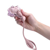 Hand holding the Wearable Panty Vibrator with Egg Vibe by Ueros, showcasing its elegant design for pleasure.