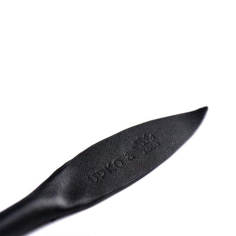 Close-up of ZALO & UPKO Doll Designer Collection Leather Thorn Whip showing detailed thorn pattern on luxury Italian leather.