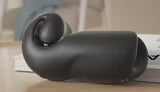 Svibe Snail Evo Dual Male Stimulator Black showcasing ergonomic design and sleek finish on a table.